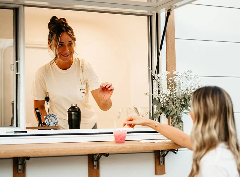 Aero Build mobile bar serving a guest
