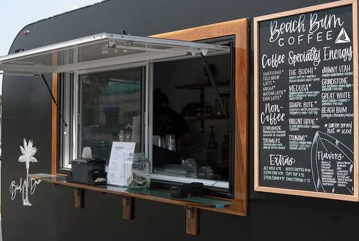 Menu displayed on the side of a Beach Bum Coffee trailer